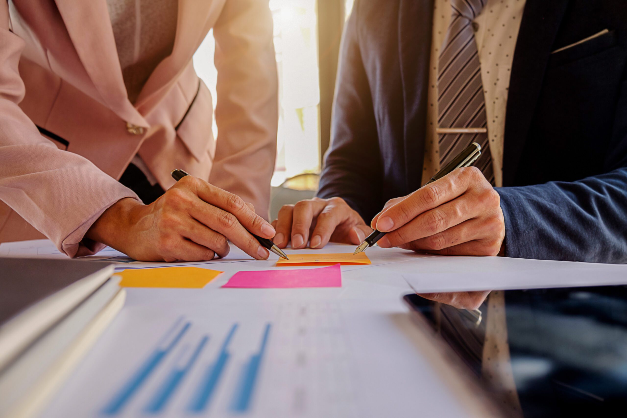 accounting hands businessman statistics discussing business scaled